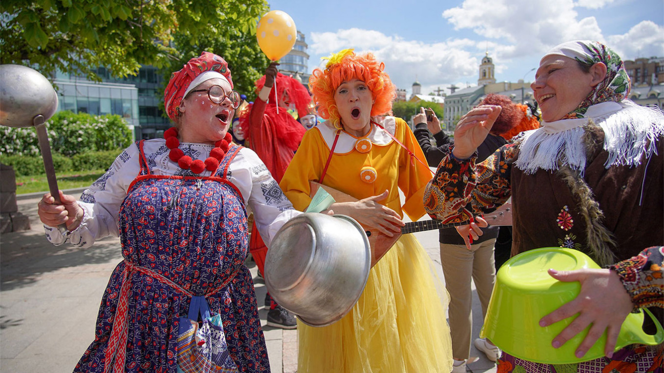 In Photos: Muscovites Seek Normalcy in Summer Events - The Moscow Times