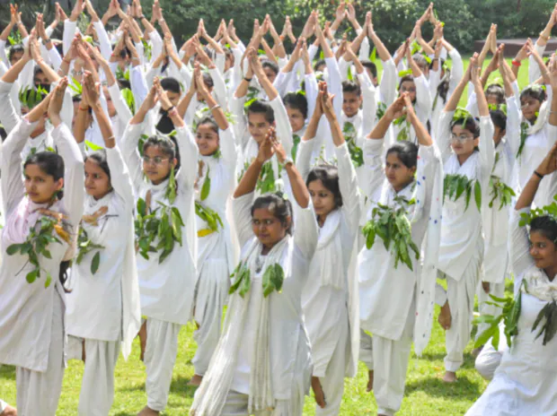 Moradabad: Students participate in a yoga programme organised to create awareness for environmental cleanliness, on the eve of World Environment Day, in Moradabad, Saturday, June 4, 2022. (PTI Photo)(